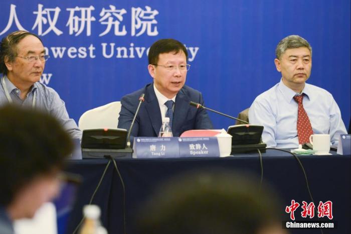 圖為西南政法大學(xué)副校長、教授唐力(右二)發(fā)言。 <a target='_blank' ></p><p  align=